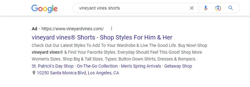 Google search results for 'vineyard vines shorts' showing an ad for shorts on Vineyard Vines' website.